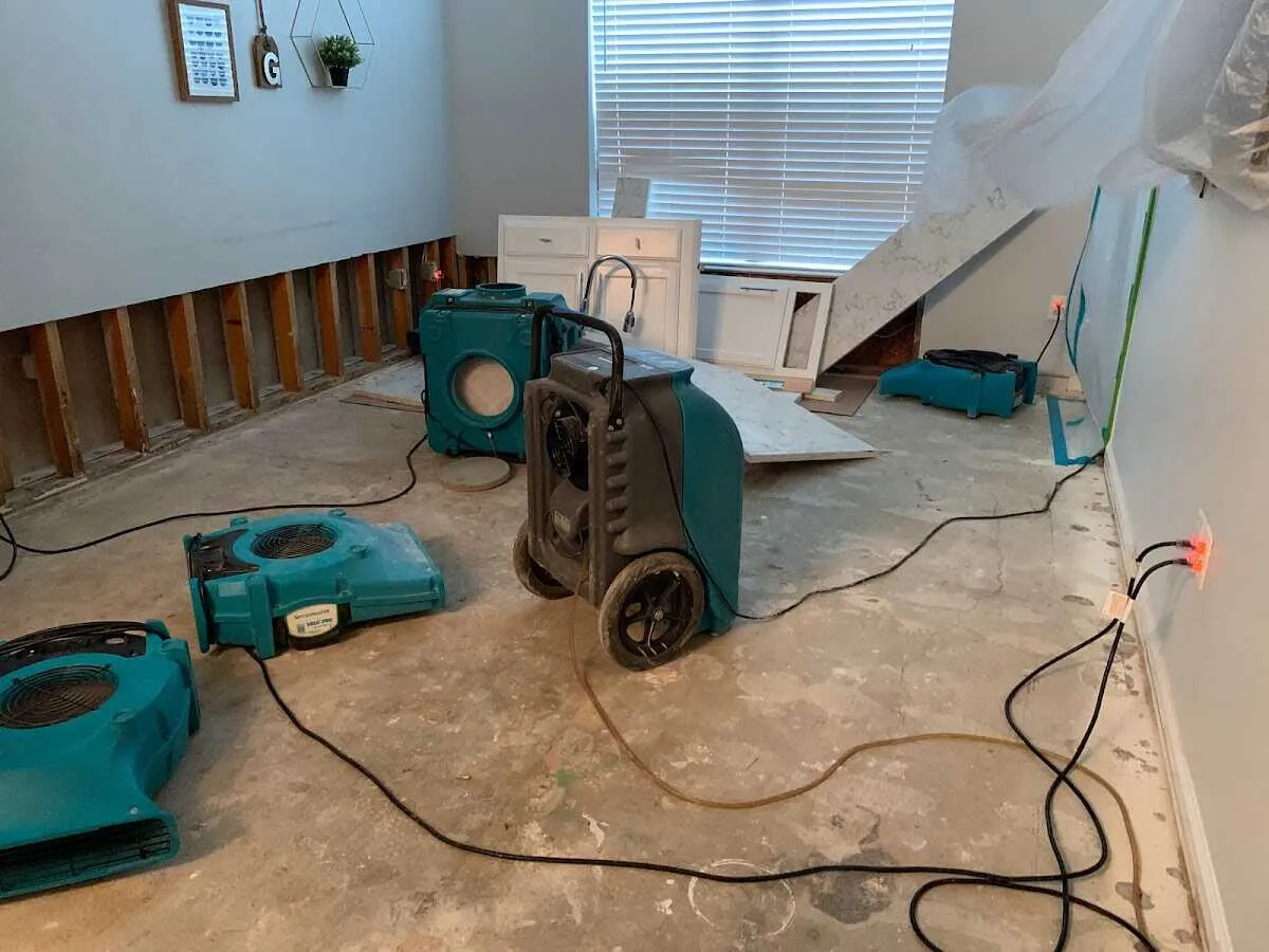 Dehumidifier in flood-cut room for Water Damage Restoration in Cramerton